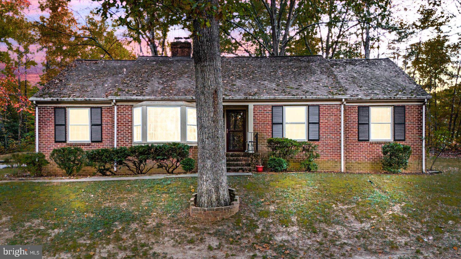 front view of house with a yard