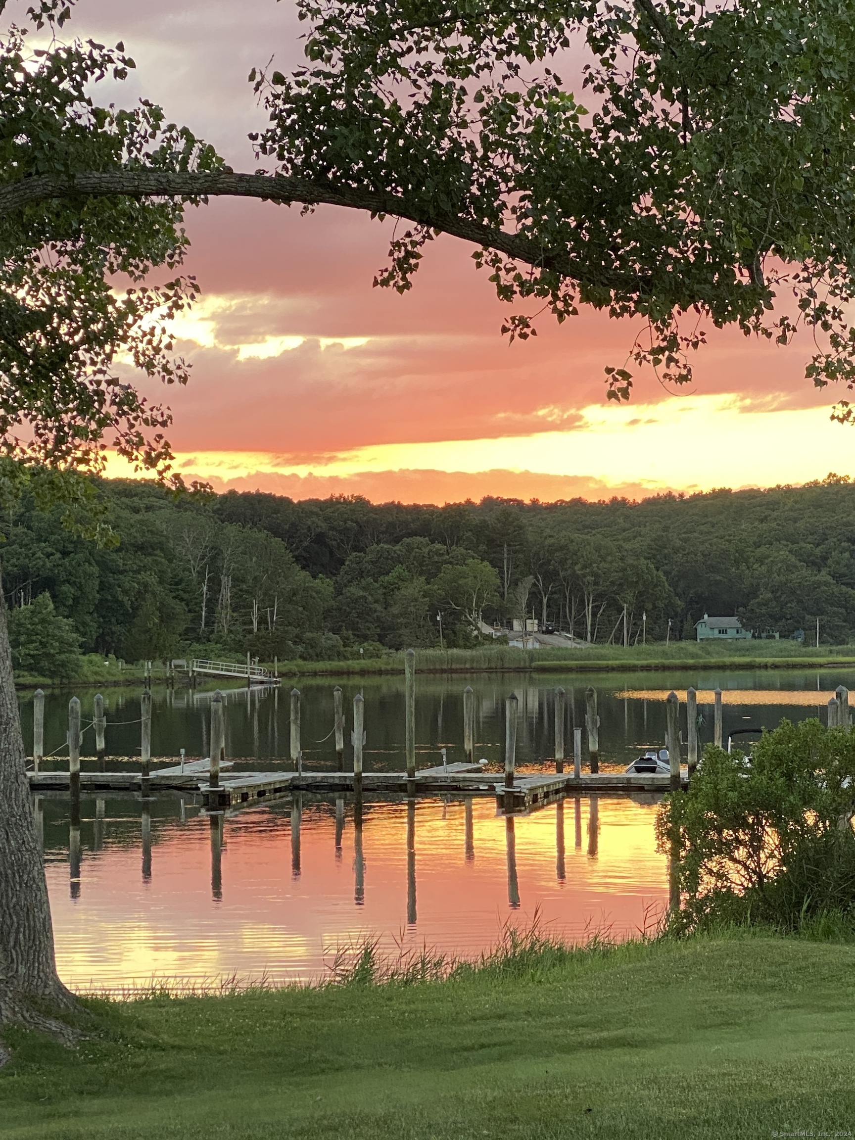 a view of lake with green space