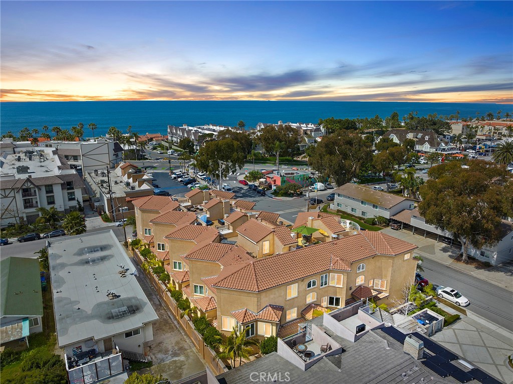 a view of a city with an ocean view