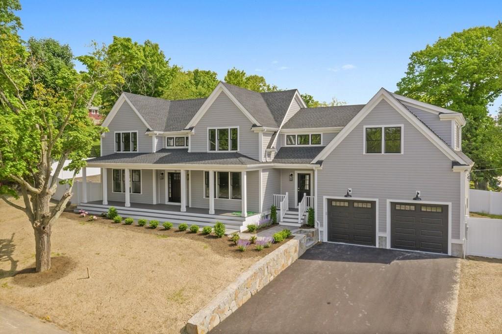 a front view of a house with yard