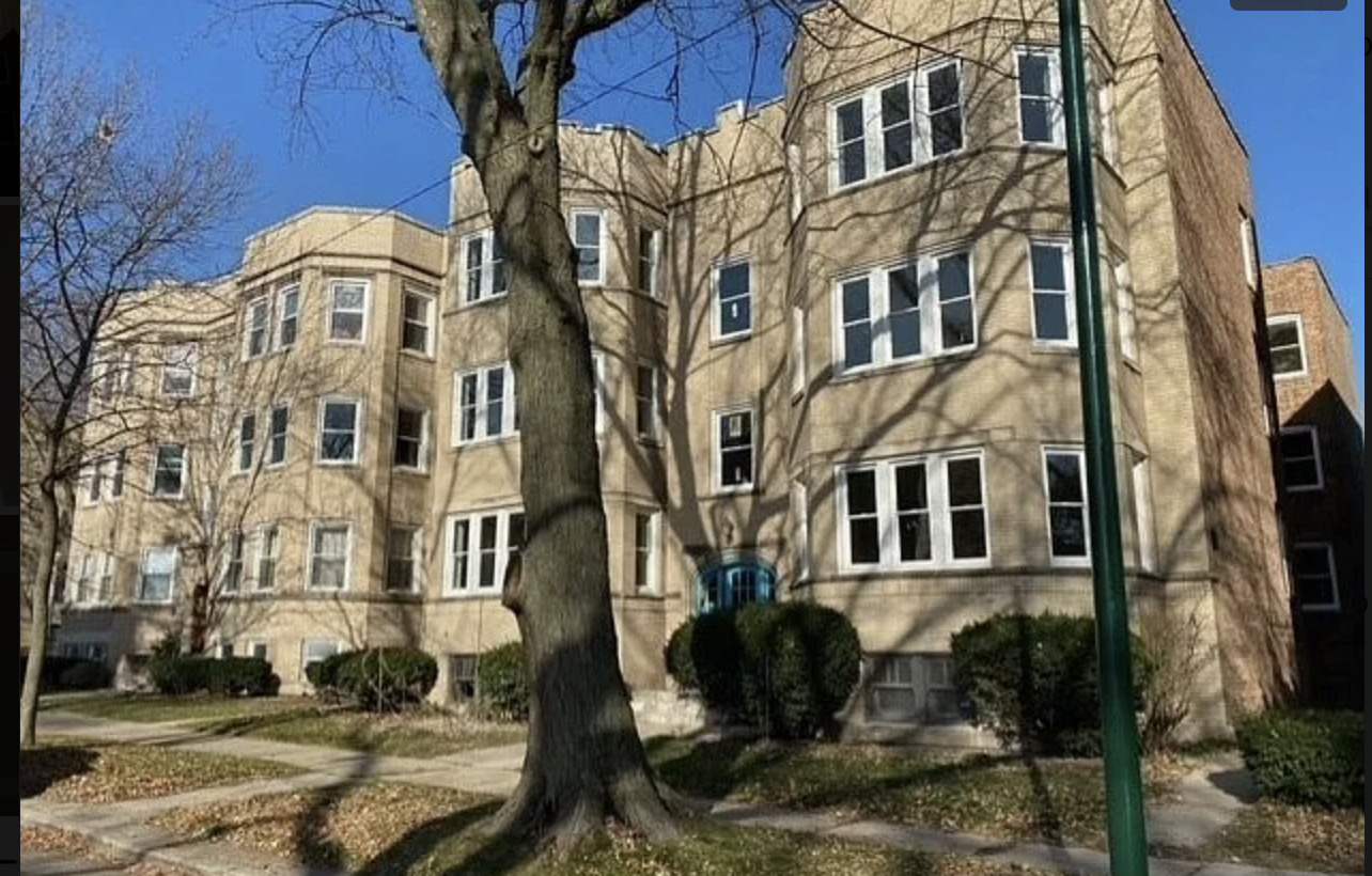 a view of a large white building