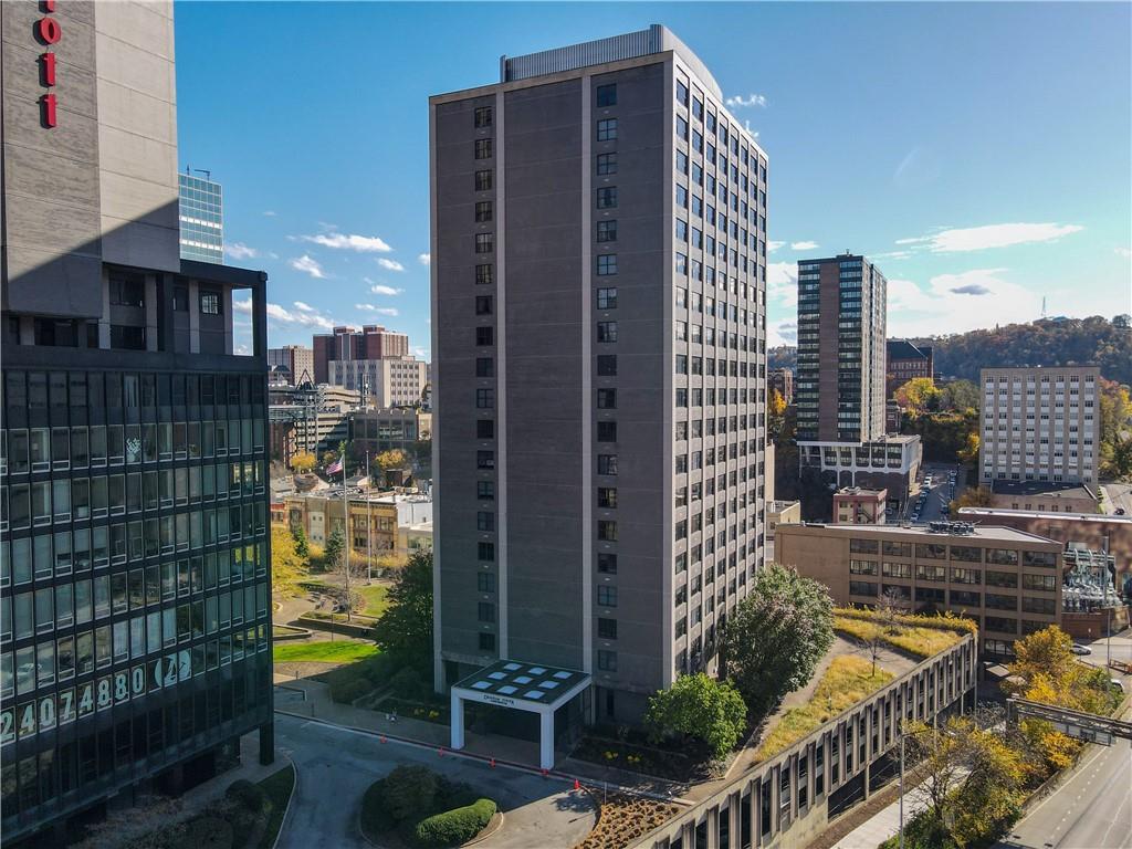 a city view with tall buildings