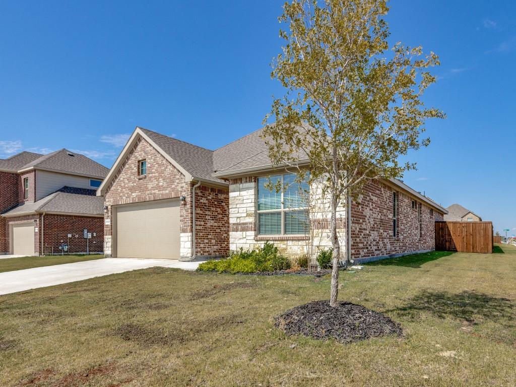 a house with a tree in front of it