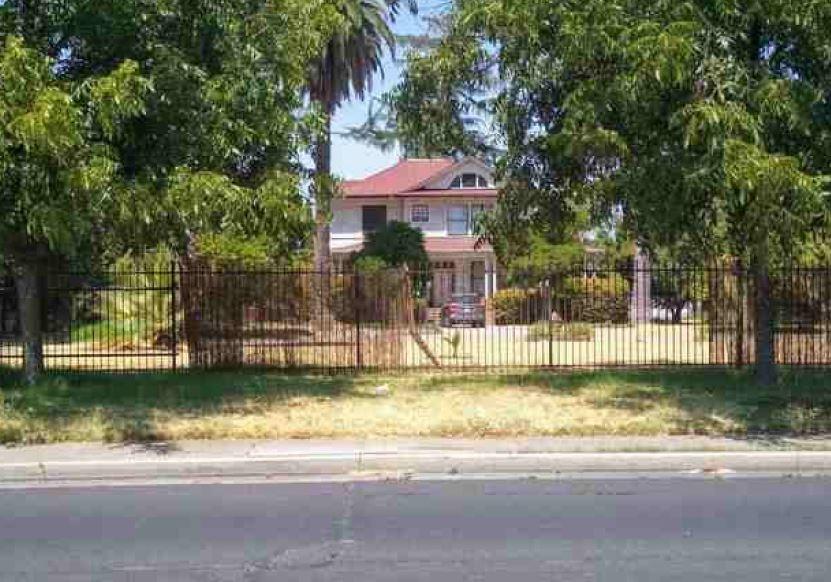 a view of a house with a swimming pool