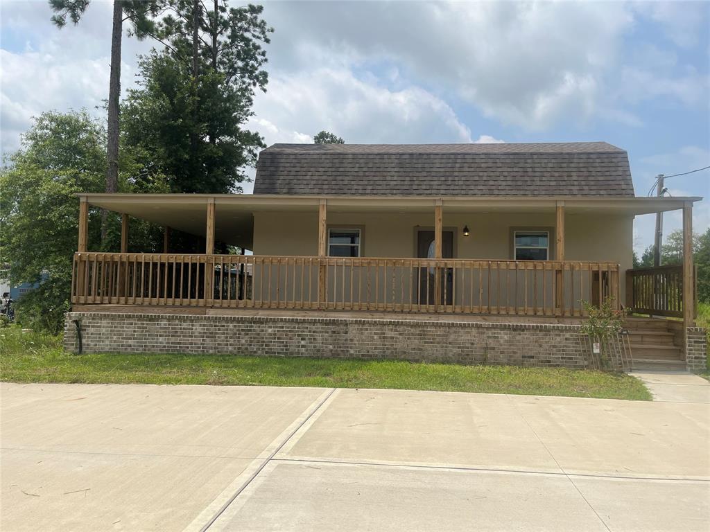 a view of house with a outdoor space