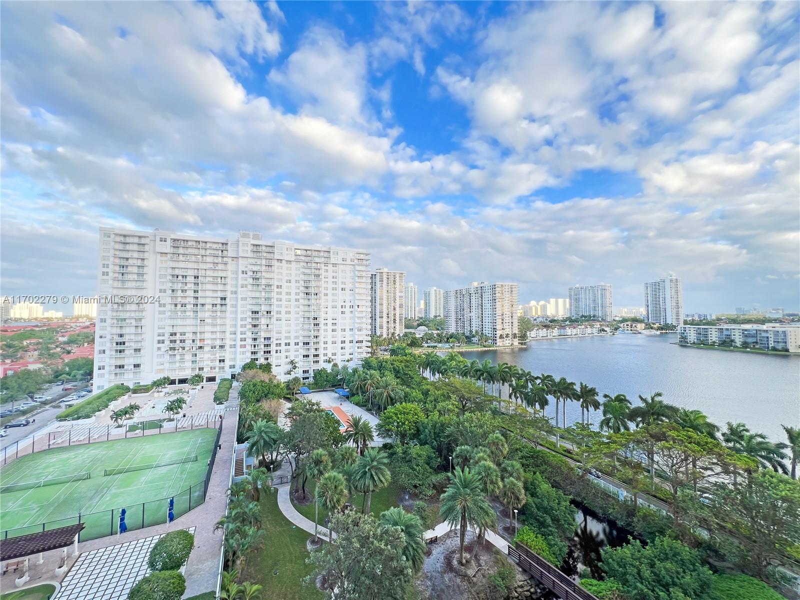 a view of a city with tall buildings