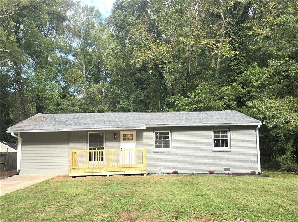 front view of a house with a yard