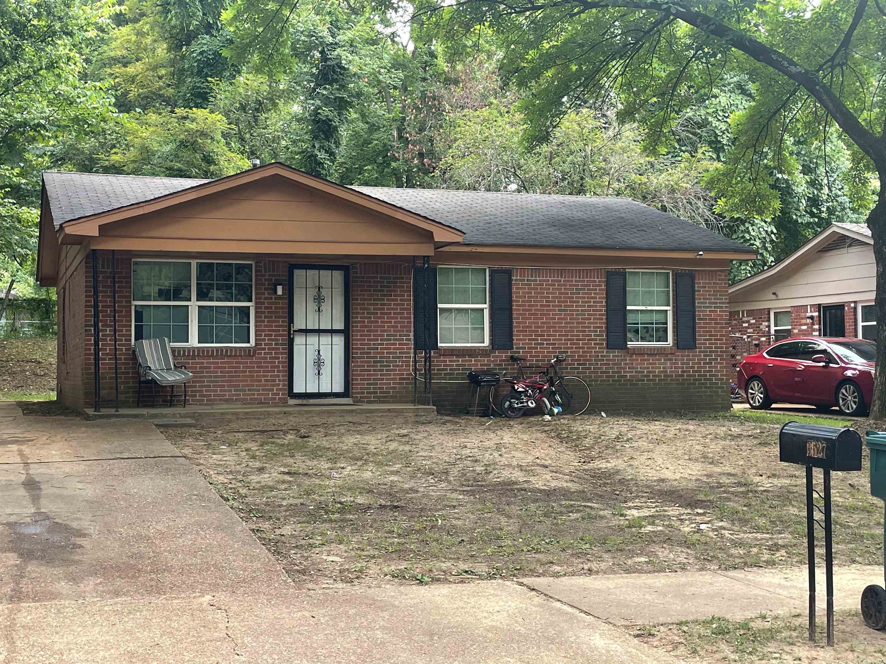 a house with yard in front of it