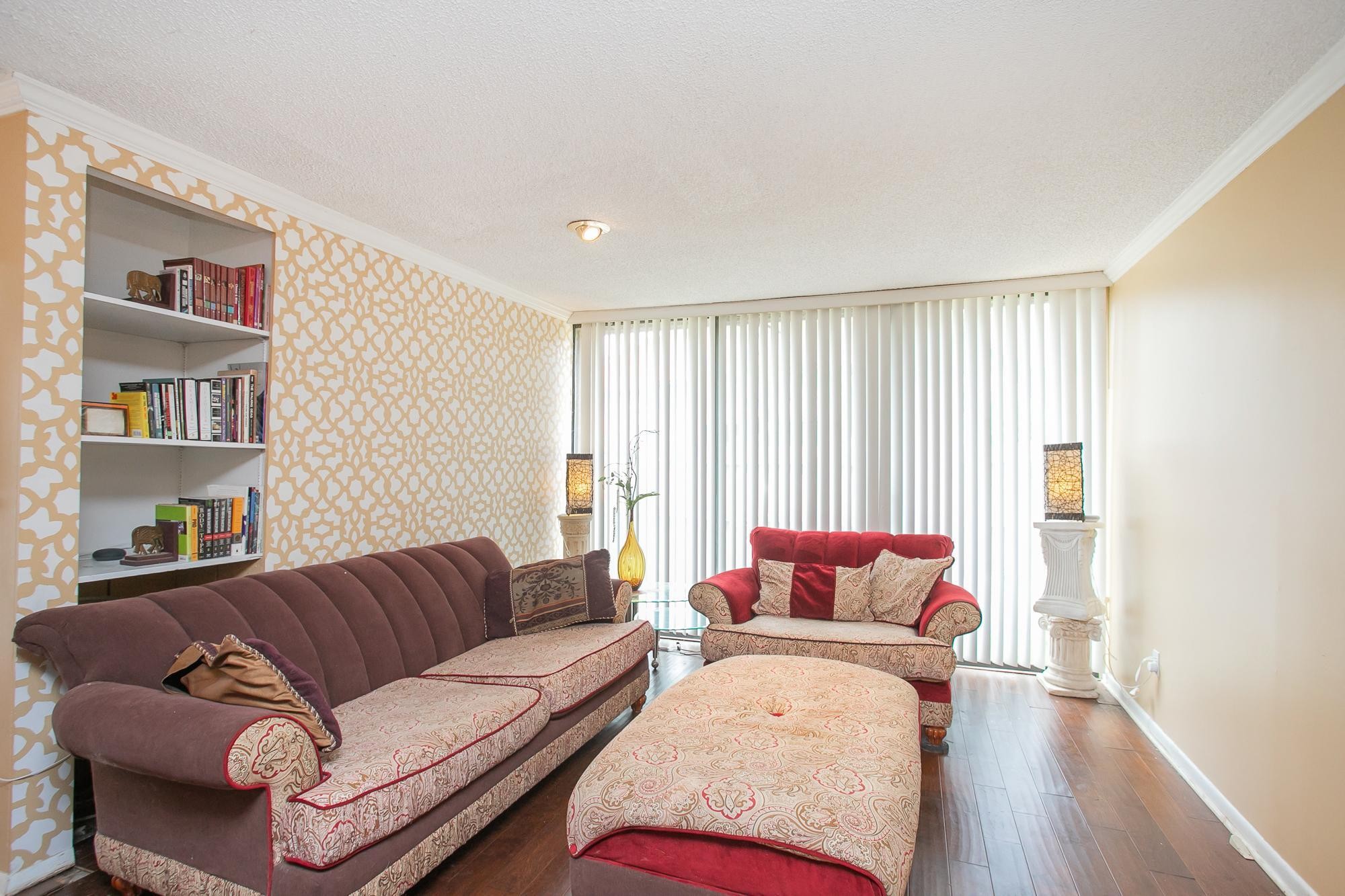 a living room with furniture and a couch