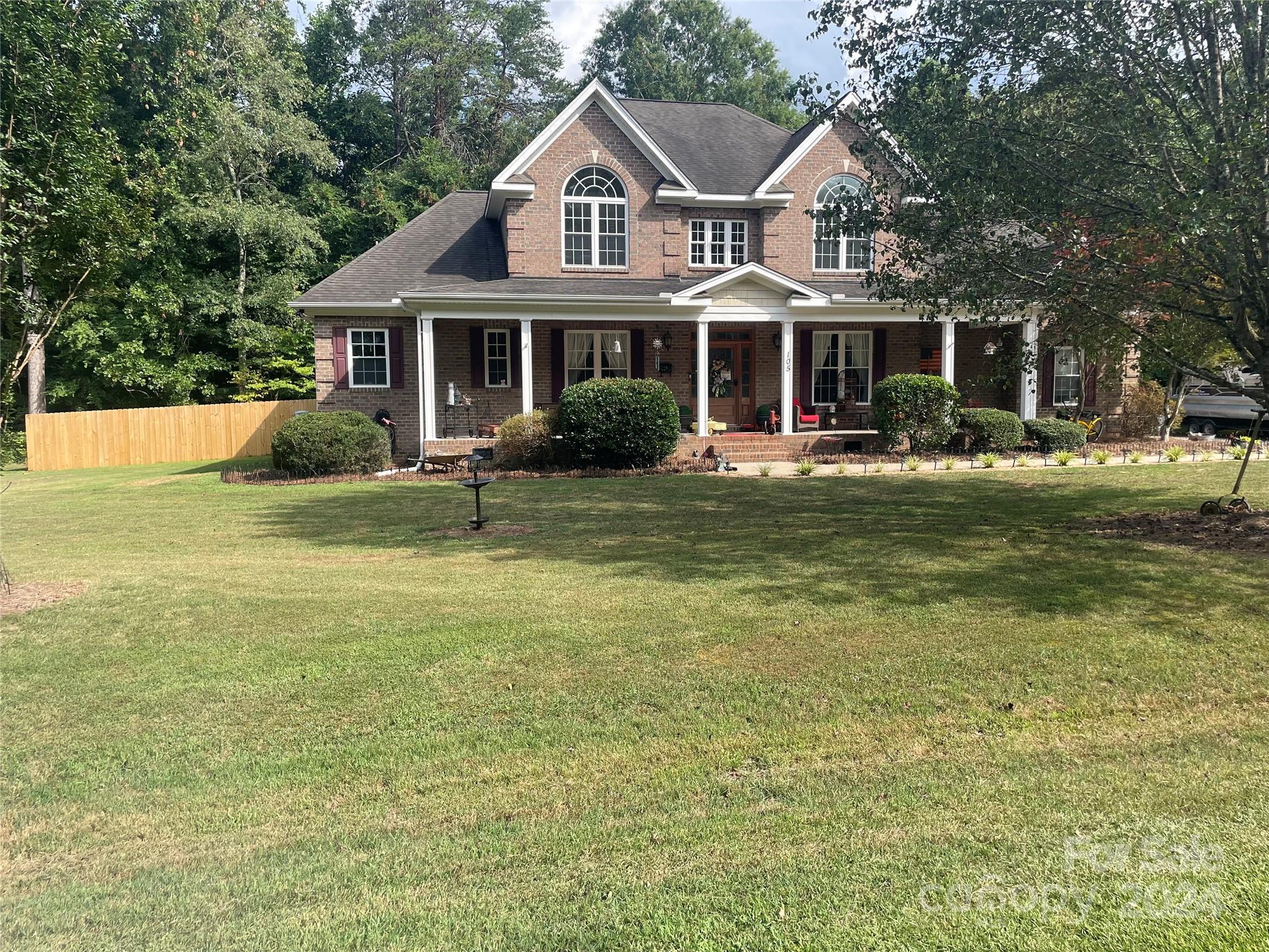 front view of a house with swimming pool