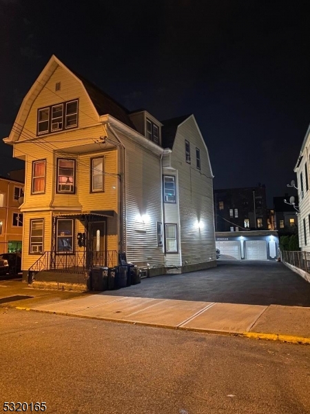 a front view of a building with street view