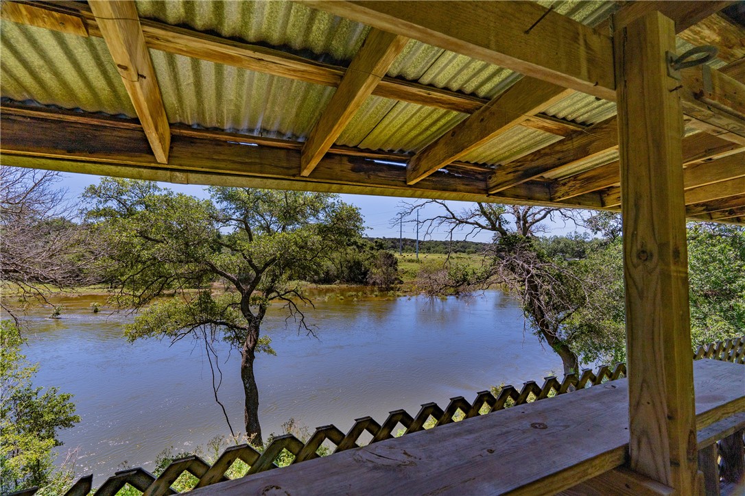 a view of a backyard of the house