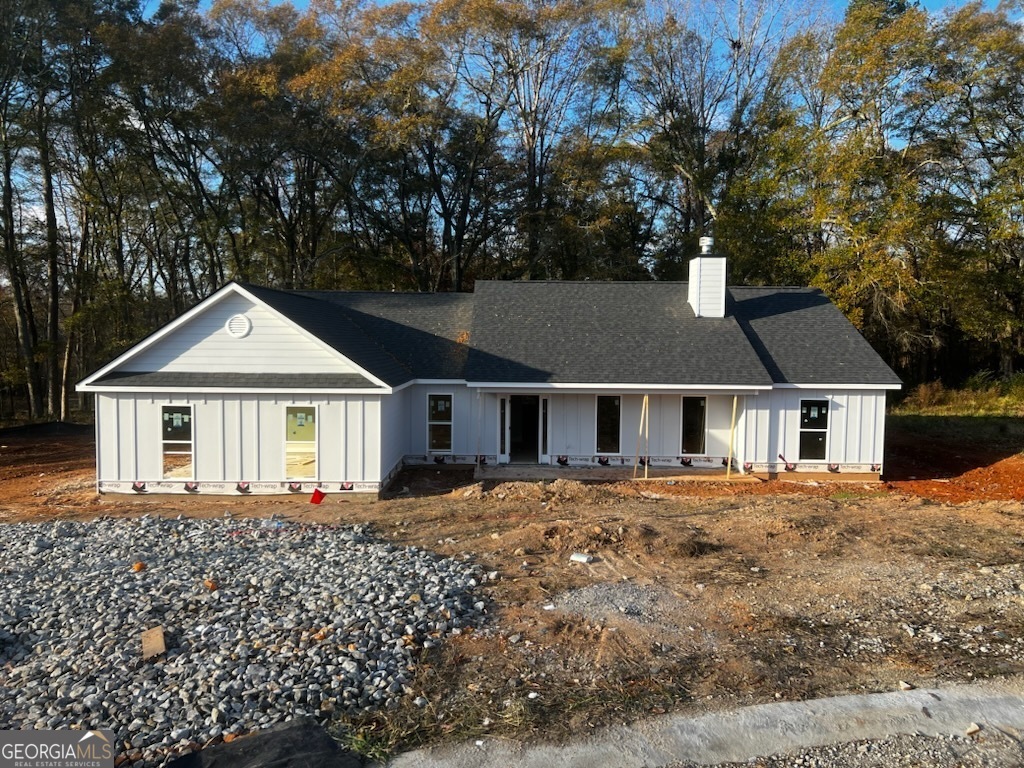 front view of house with a yard