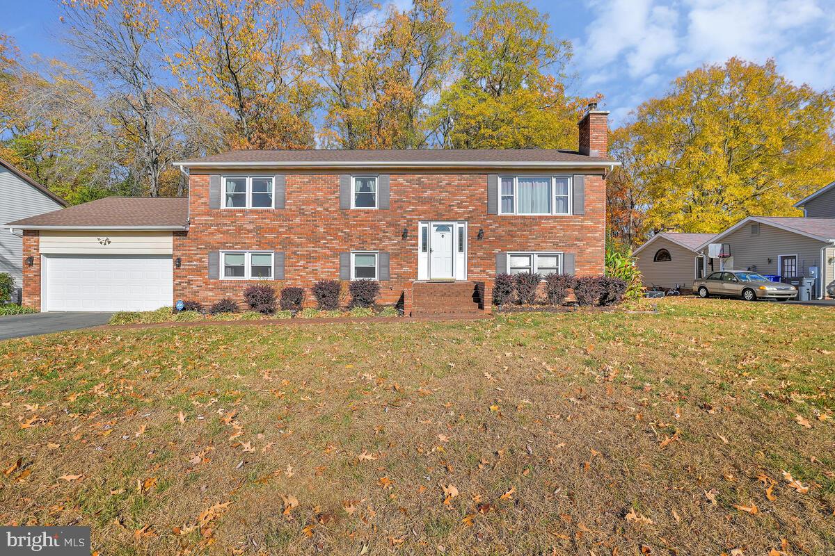 front view of a house with a big yard