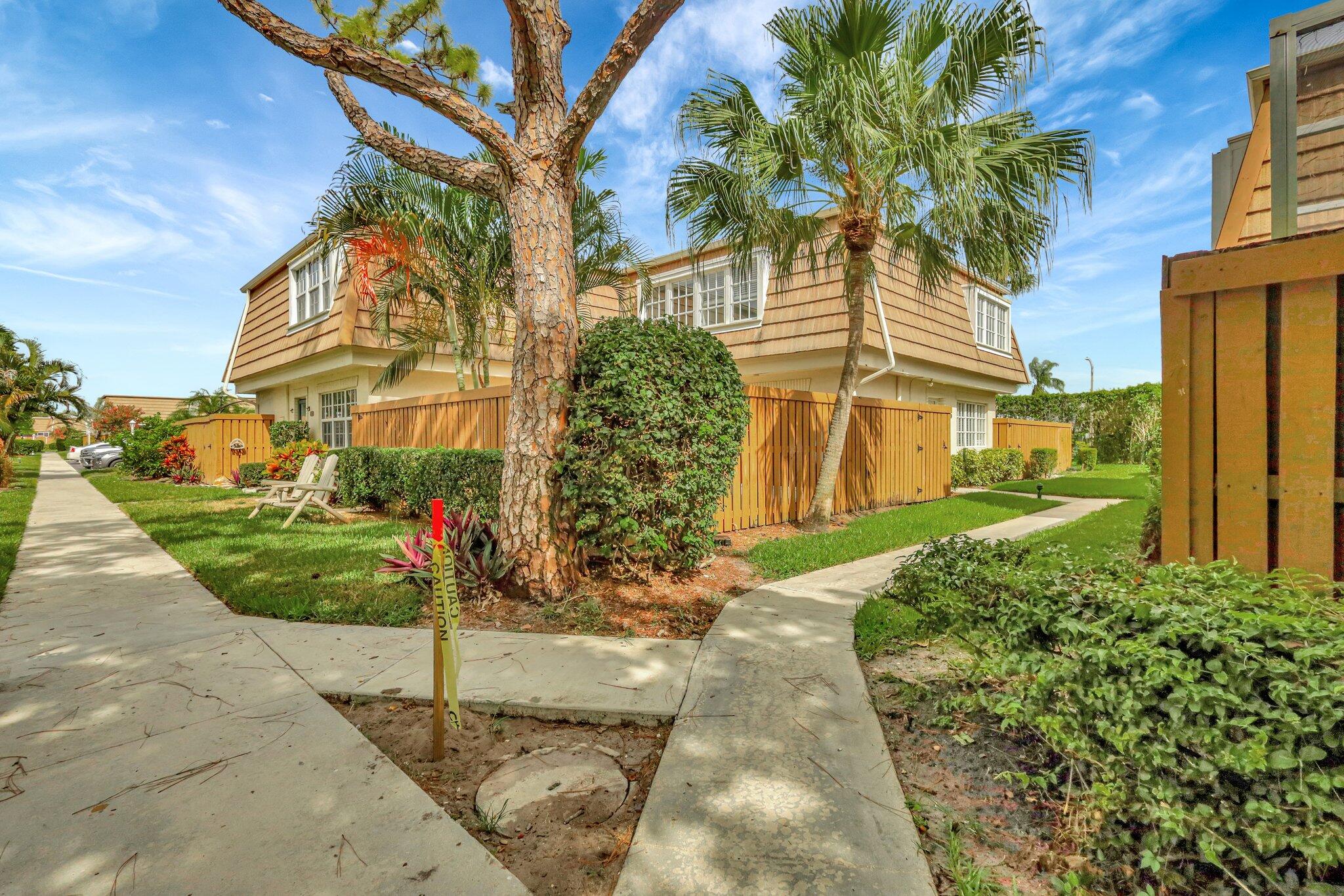 a view of a back yard of the house