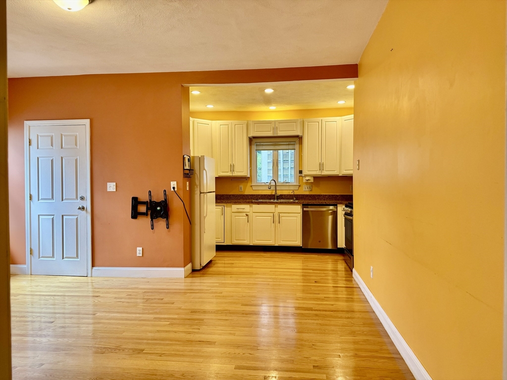 a view of a kitchen with a sink