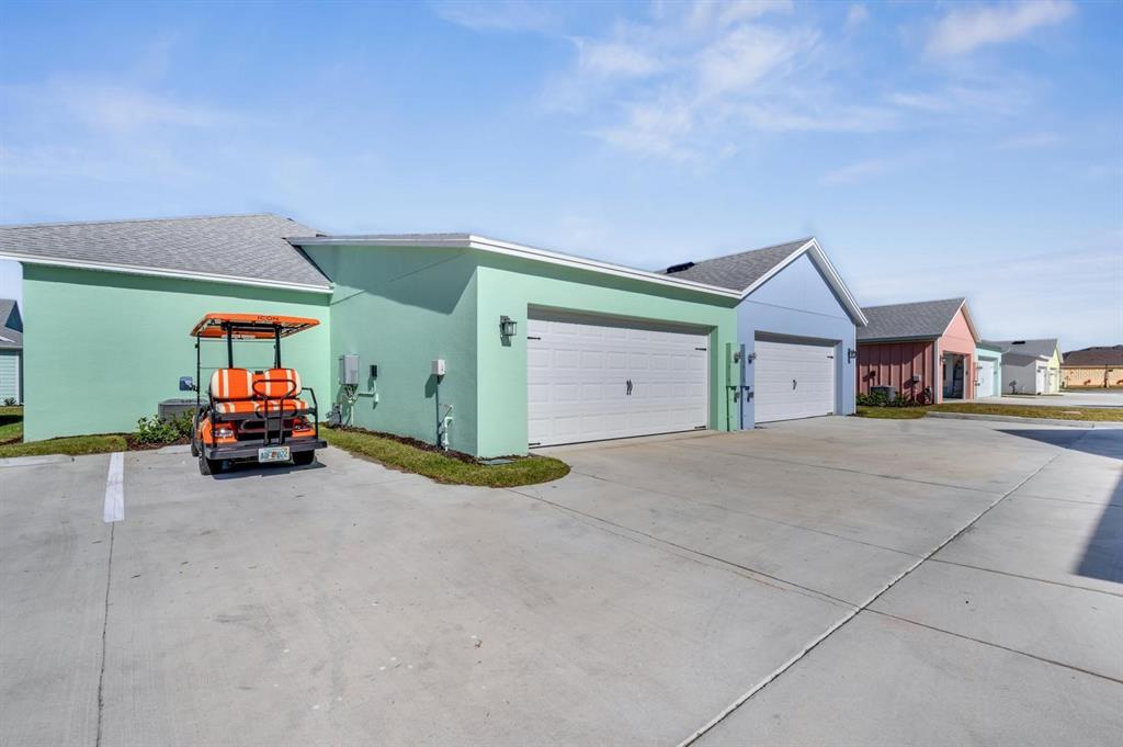 a view of a house with furniture and garage