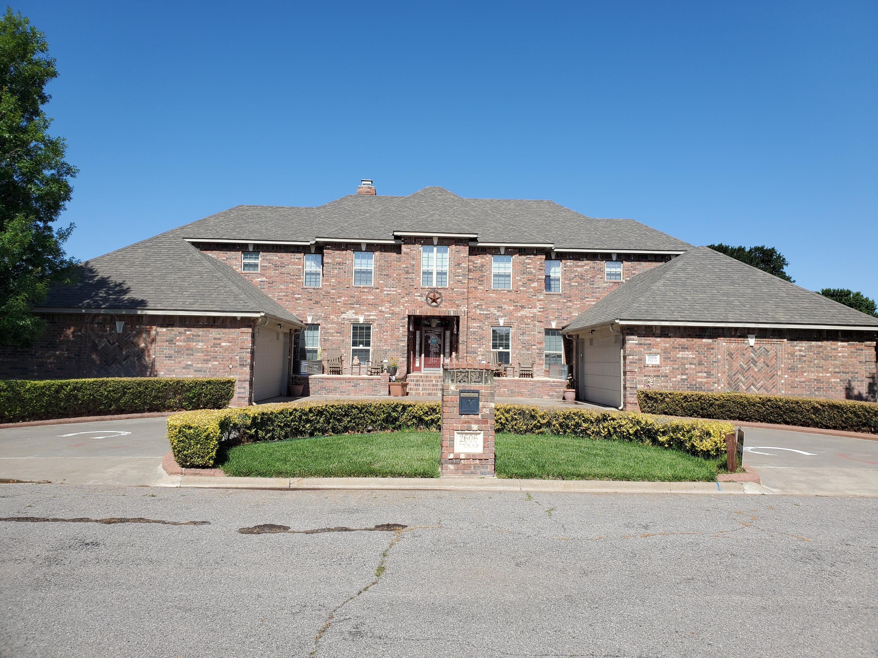 front view of house with a yard