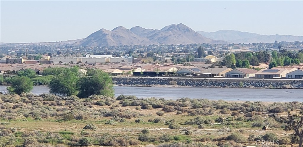 a view of a house with a mountain