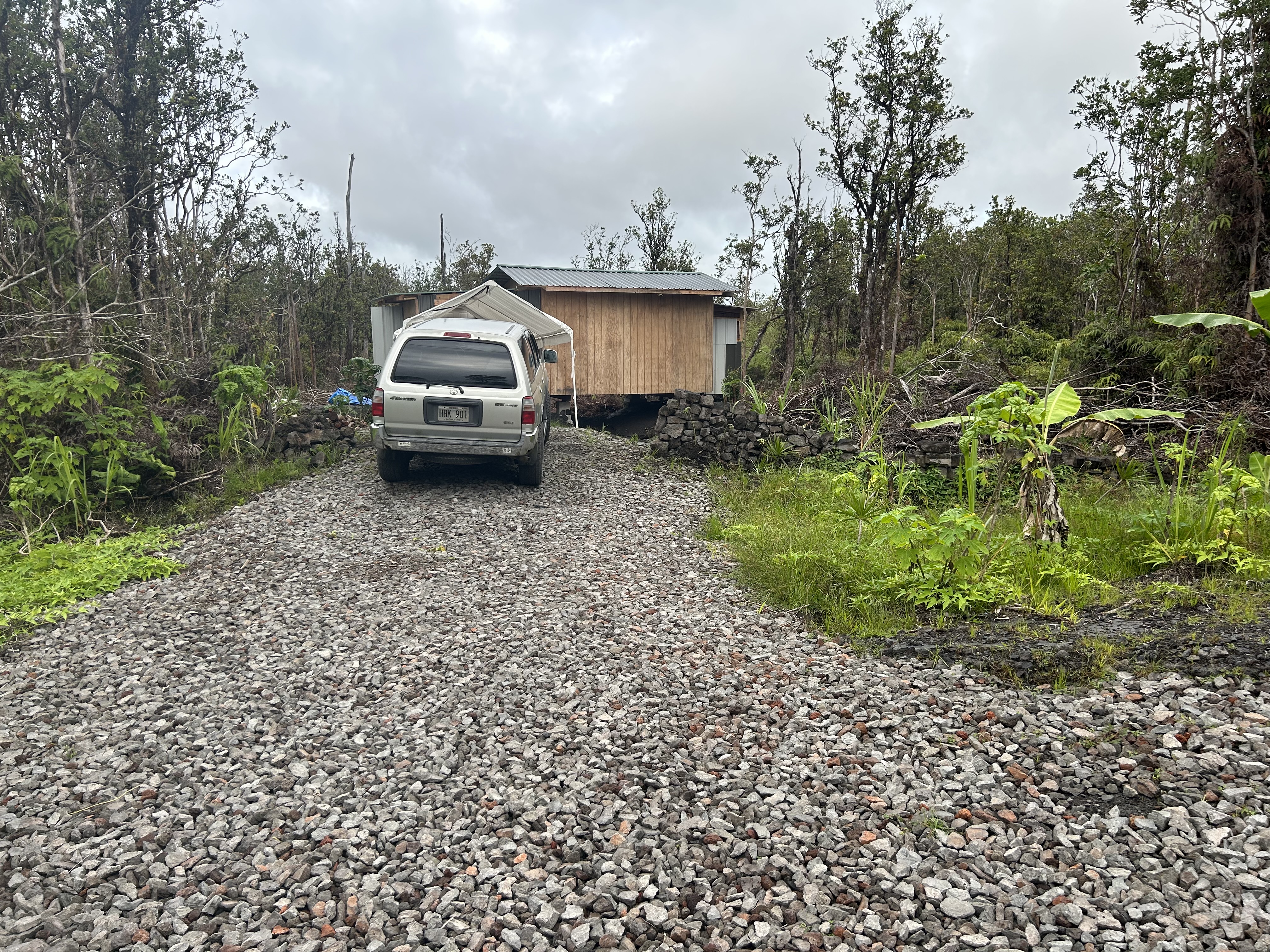 CRUSHED STONE DRIVEWAY MAKES A CONVENIENT ENTRANCE TO THE PROPERTY.