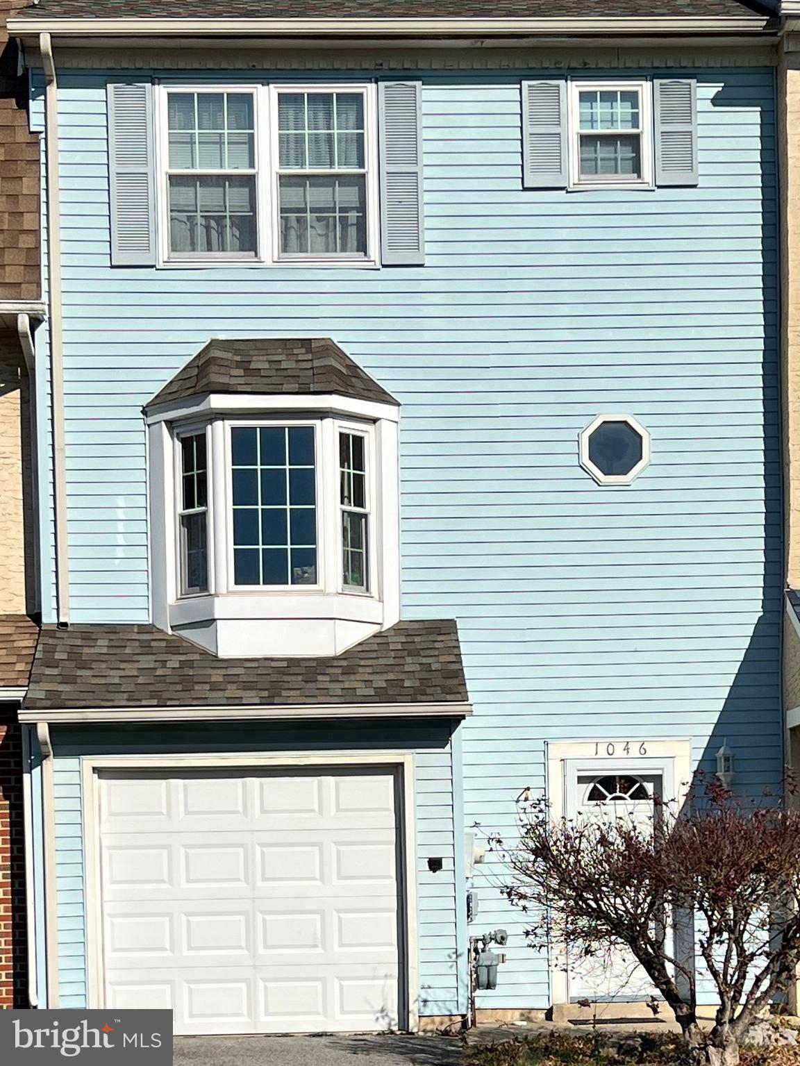 a front view of a house with windows