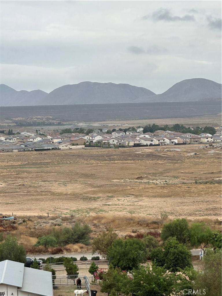 a view of an ocean and mountain