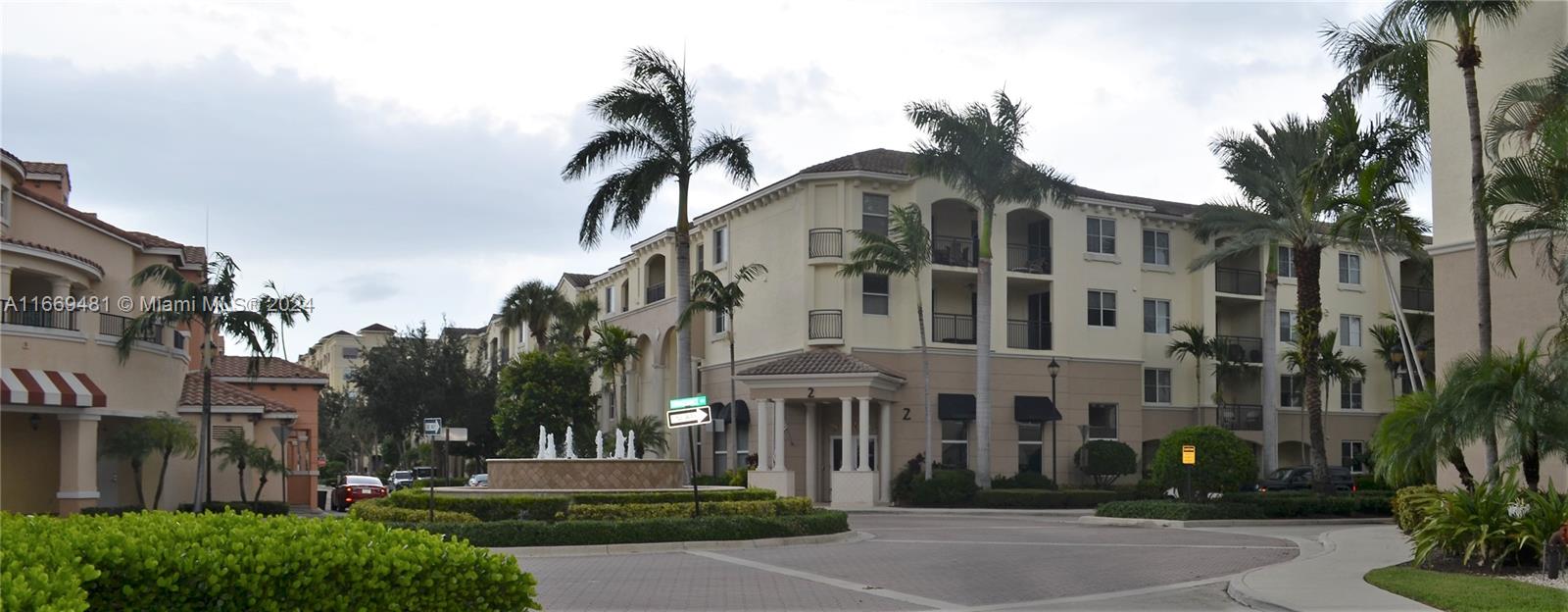 a view of a building with a yard