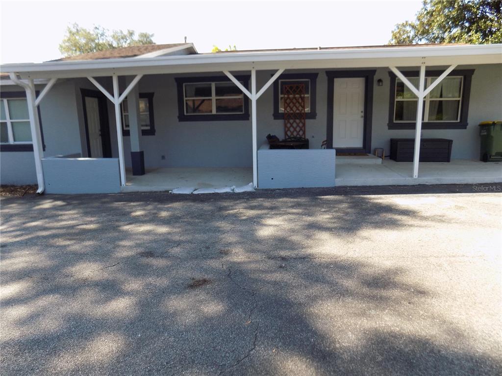 a view of house with garage