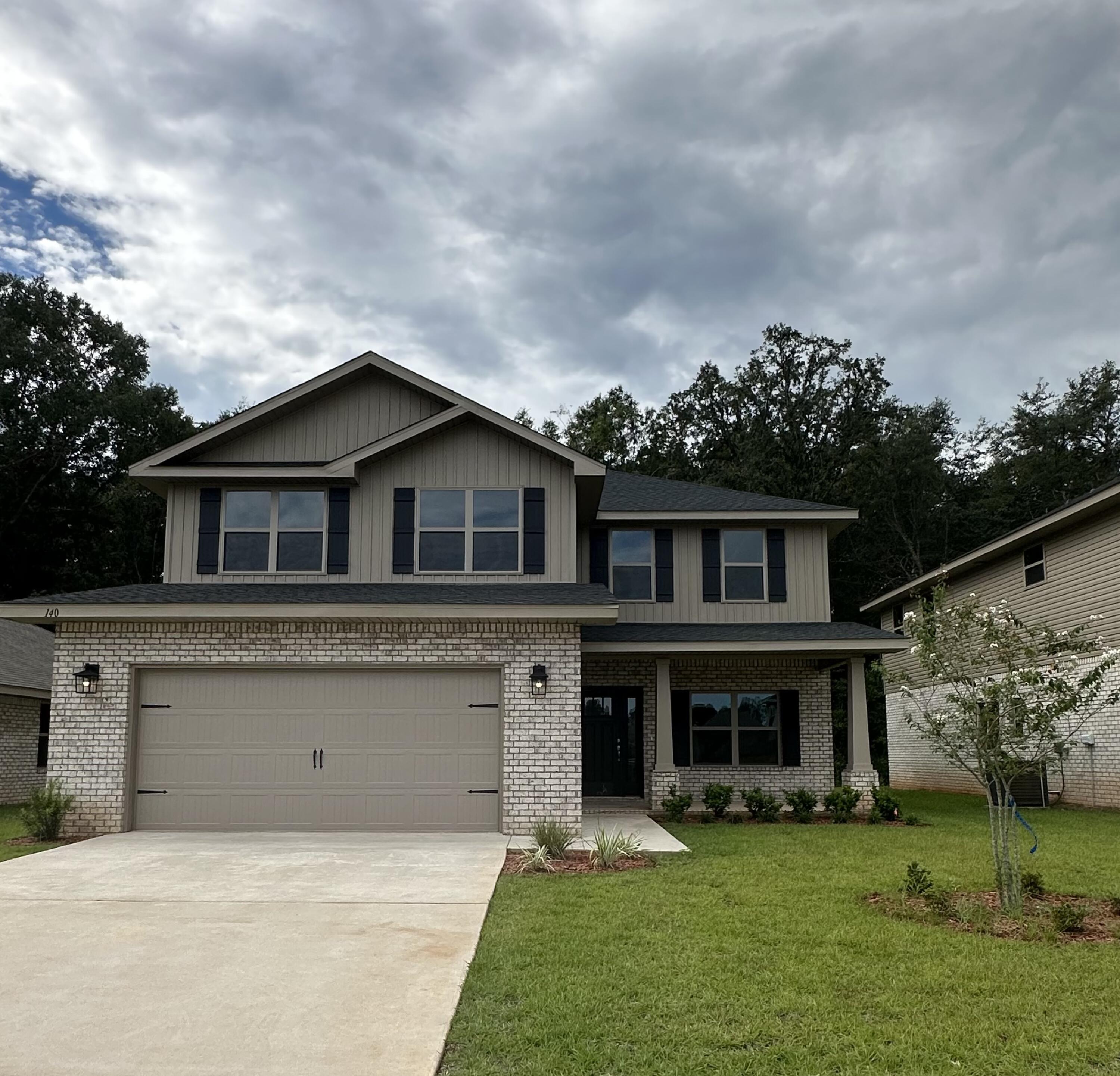 a front view of house with yard