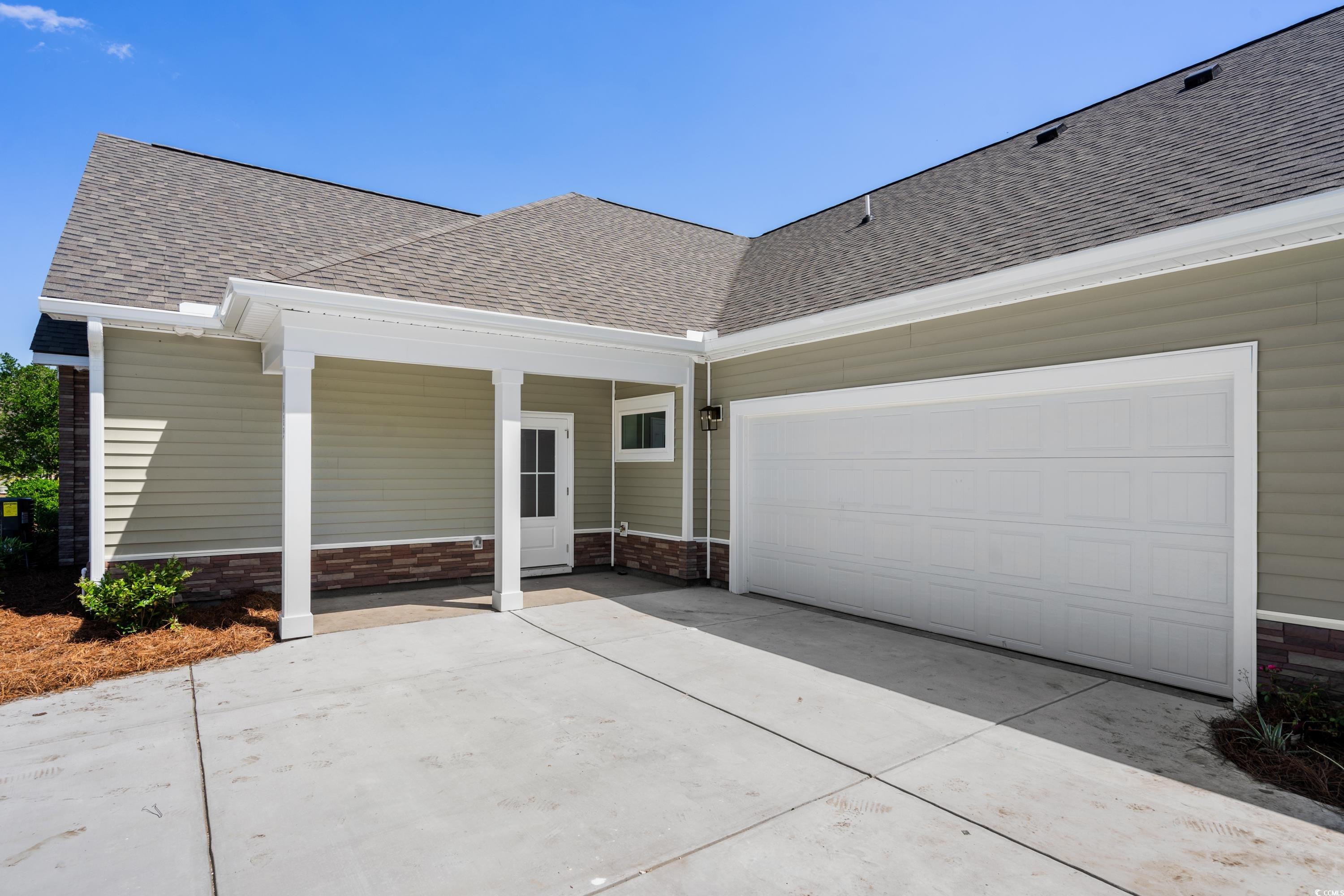 Exterior space featuring a garage