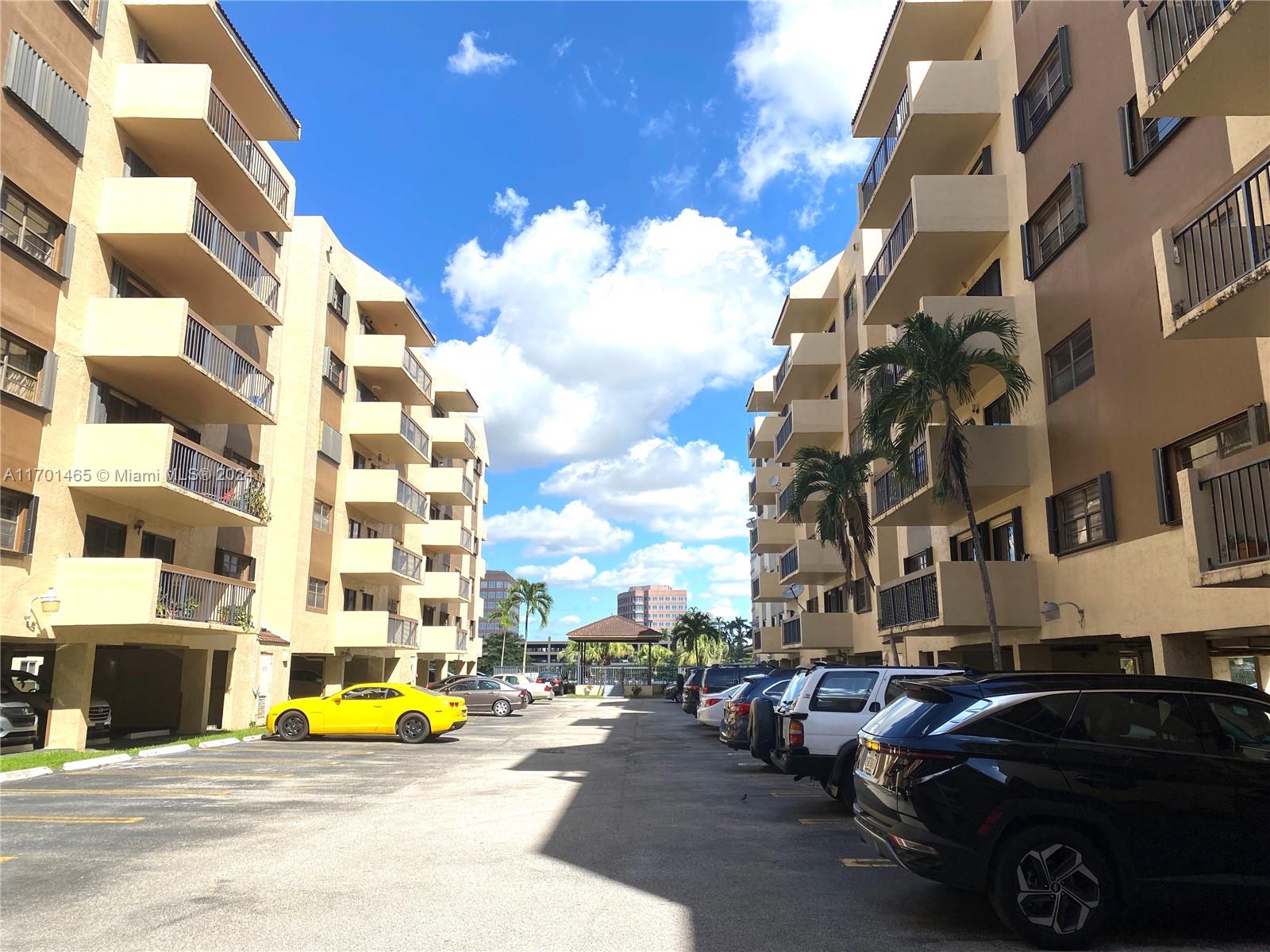 a view of a street with cars