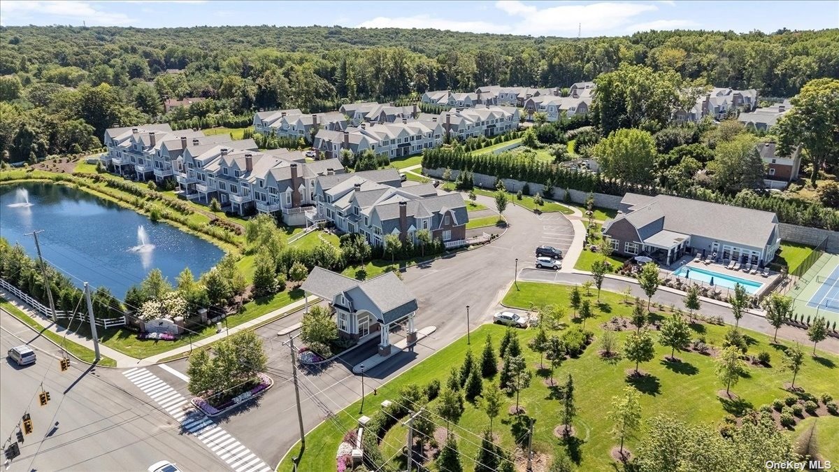 an aerial view of a house with a garden