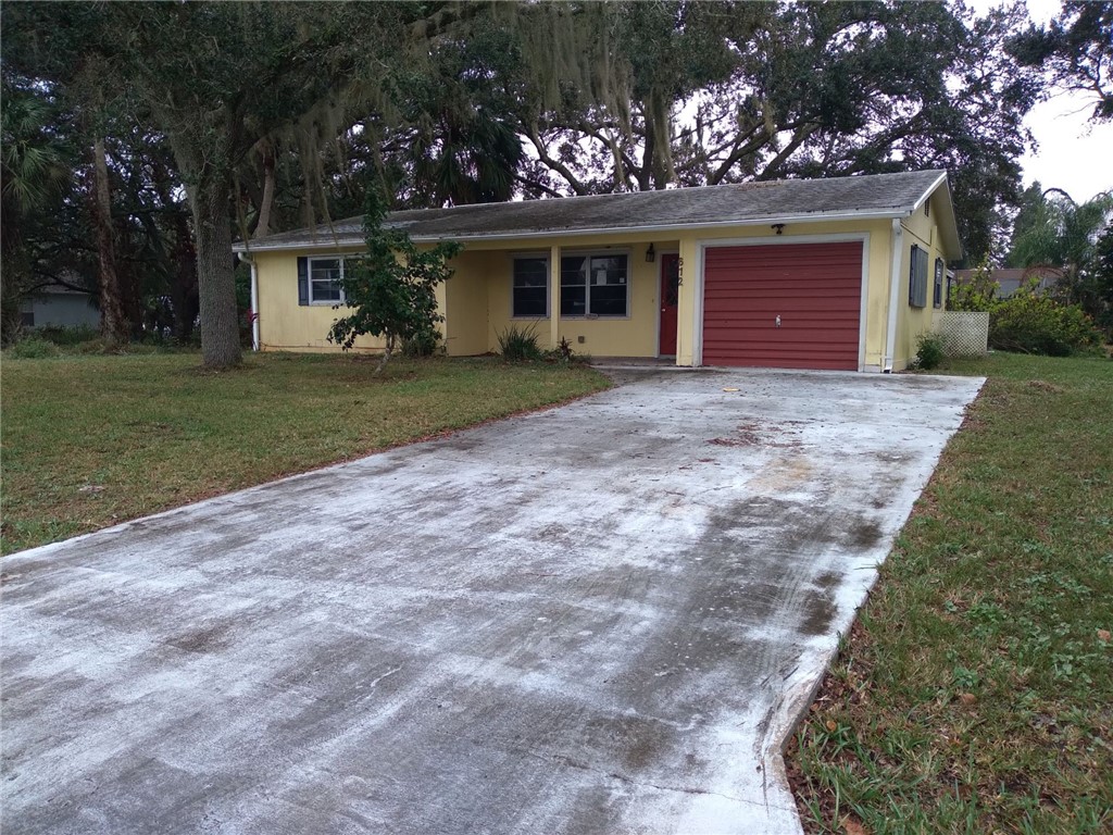 a front view of house with yard