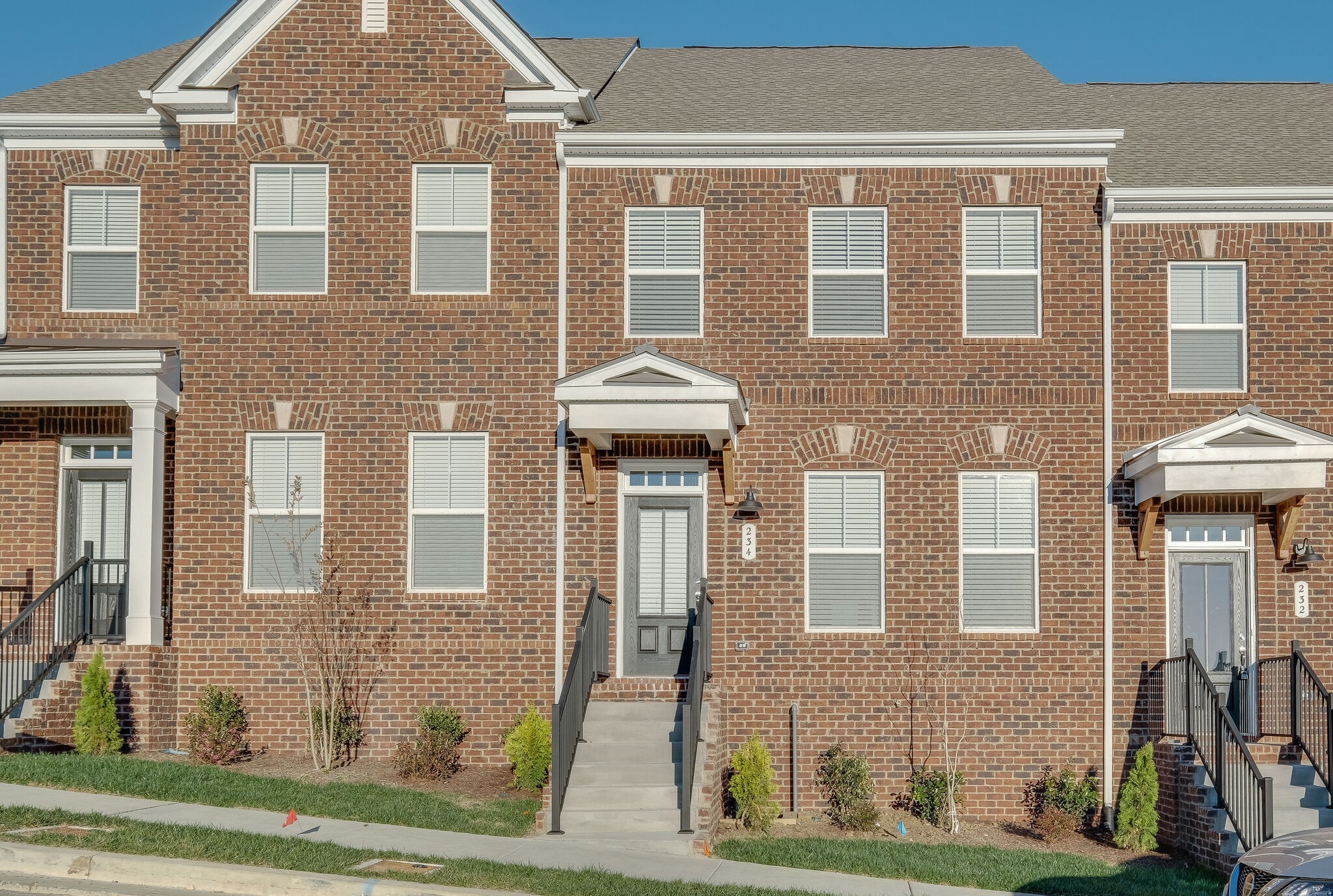 a front view of a brick house