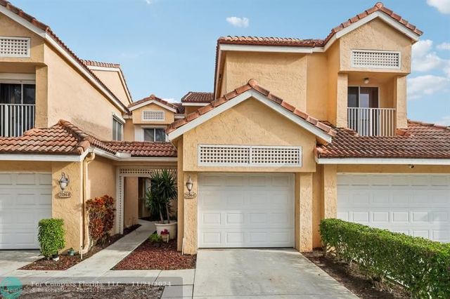 $410,000 | 23204 Fountain View Drive, Unit E | Boca del Mar