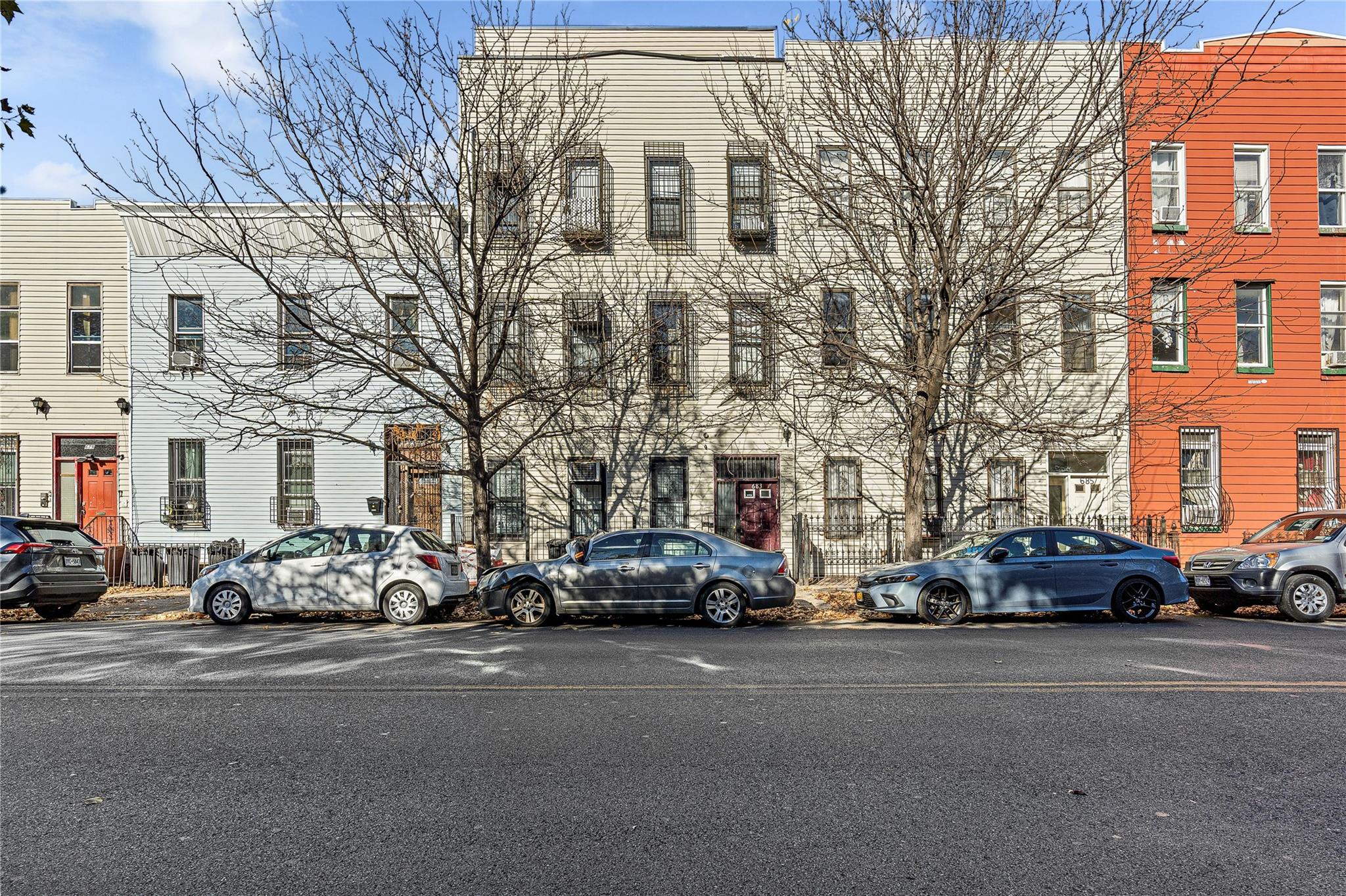 a cars parked in front of a building