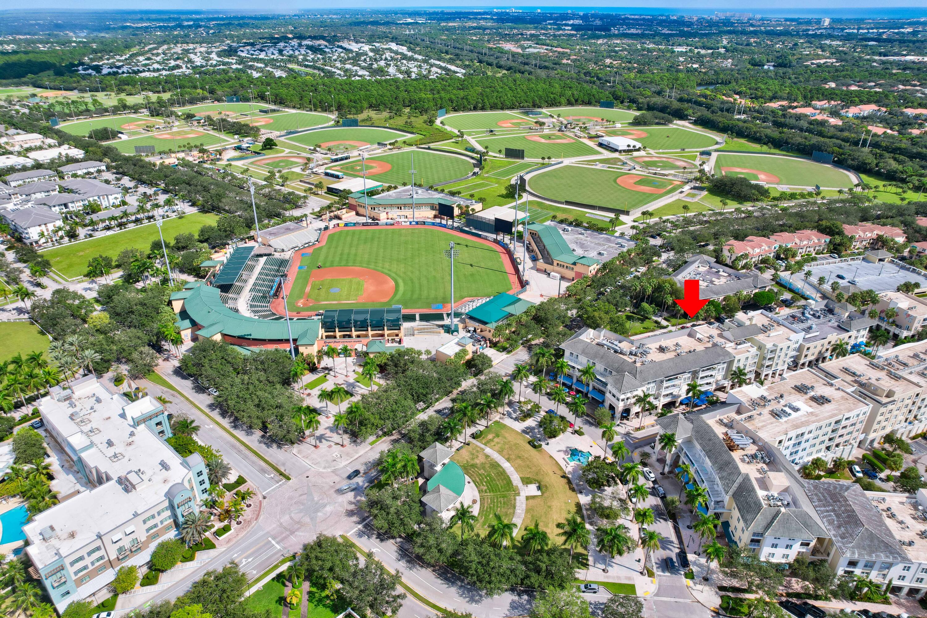 an aerial view of residential houses with outdoor space