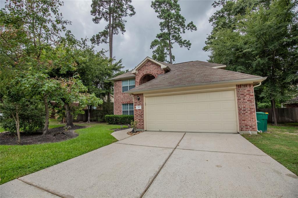 a front view of house with yard