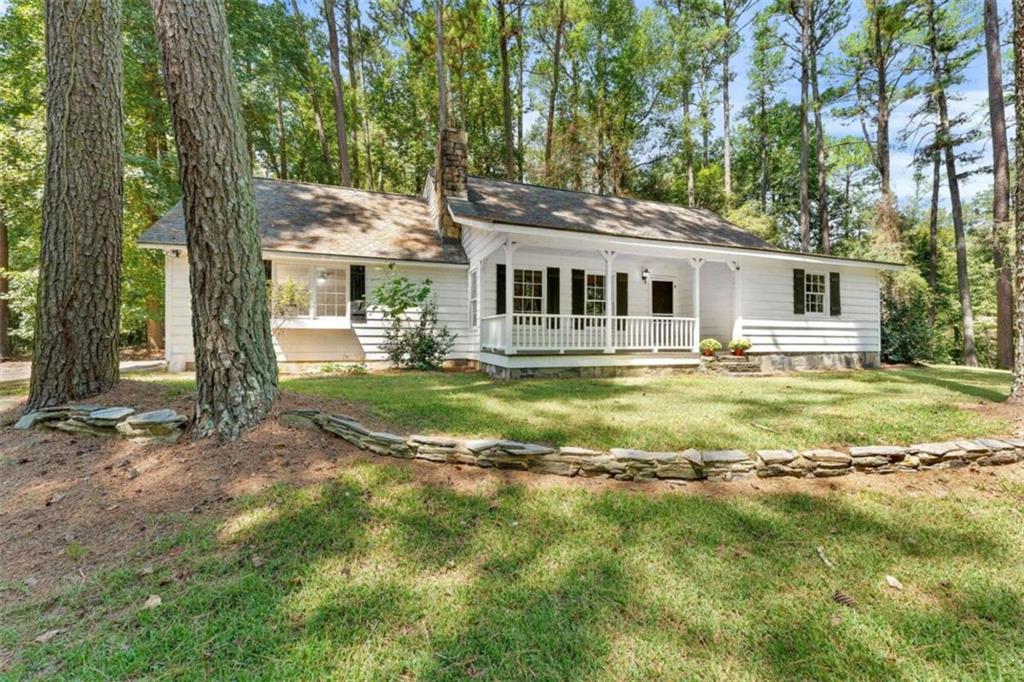 a view of a house with a big yard