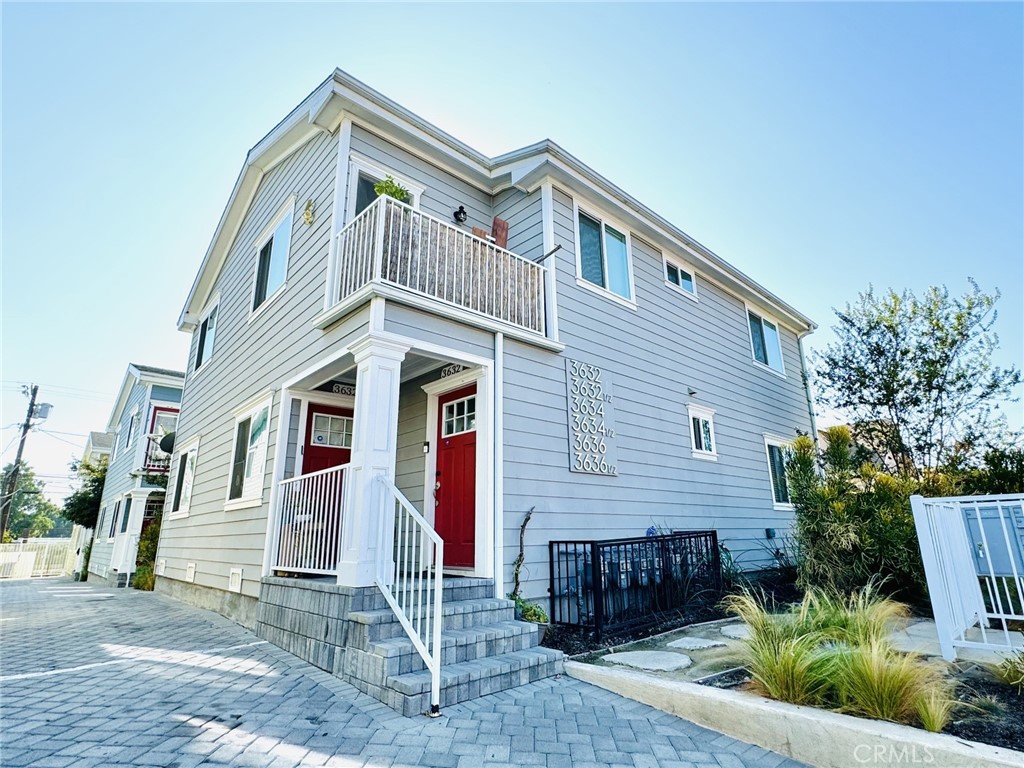 a front view of a house with garage