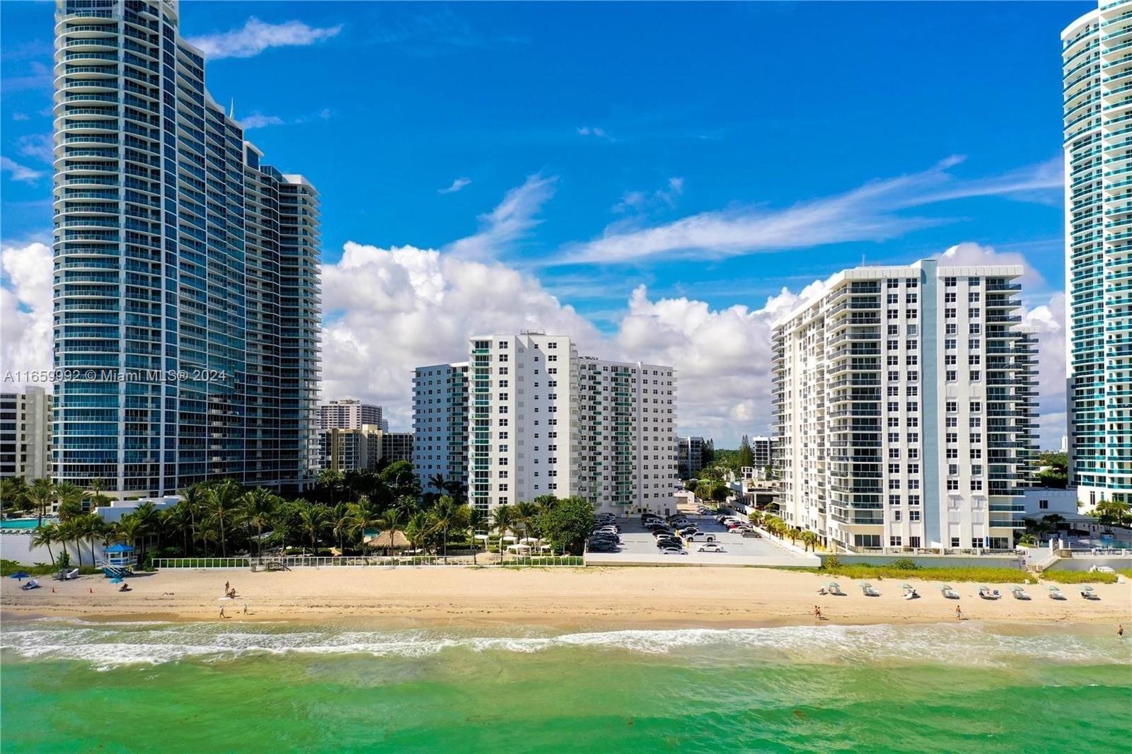 a view of a city with tall buildings