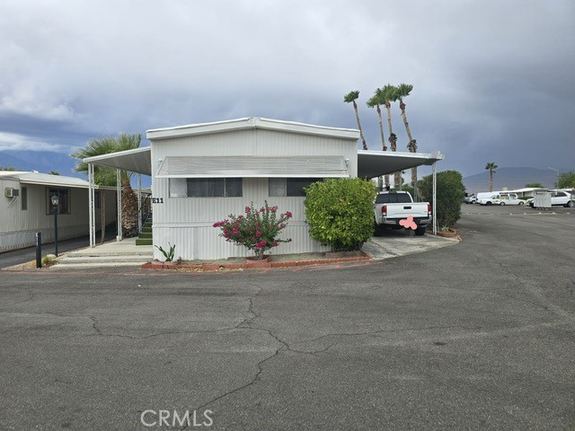 front view of a house with a street