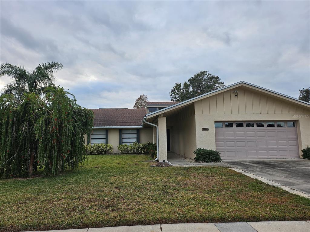 front view of house with a yard