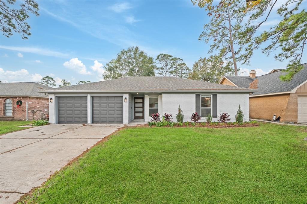 front view of a house and a yard