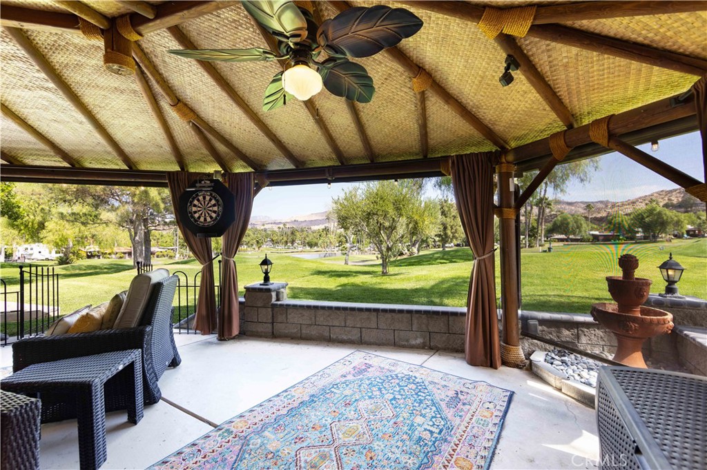 a view of a swimming pool with a patio