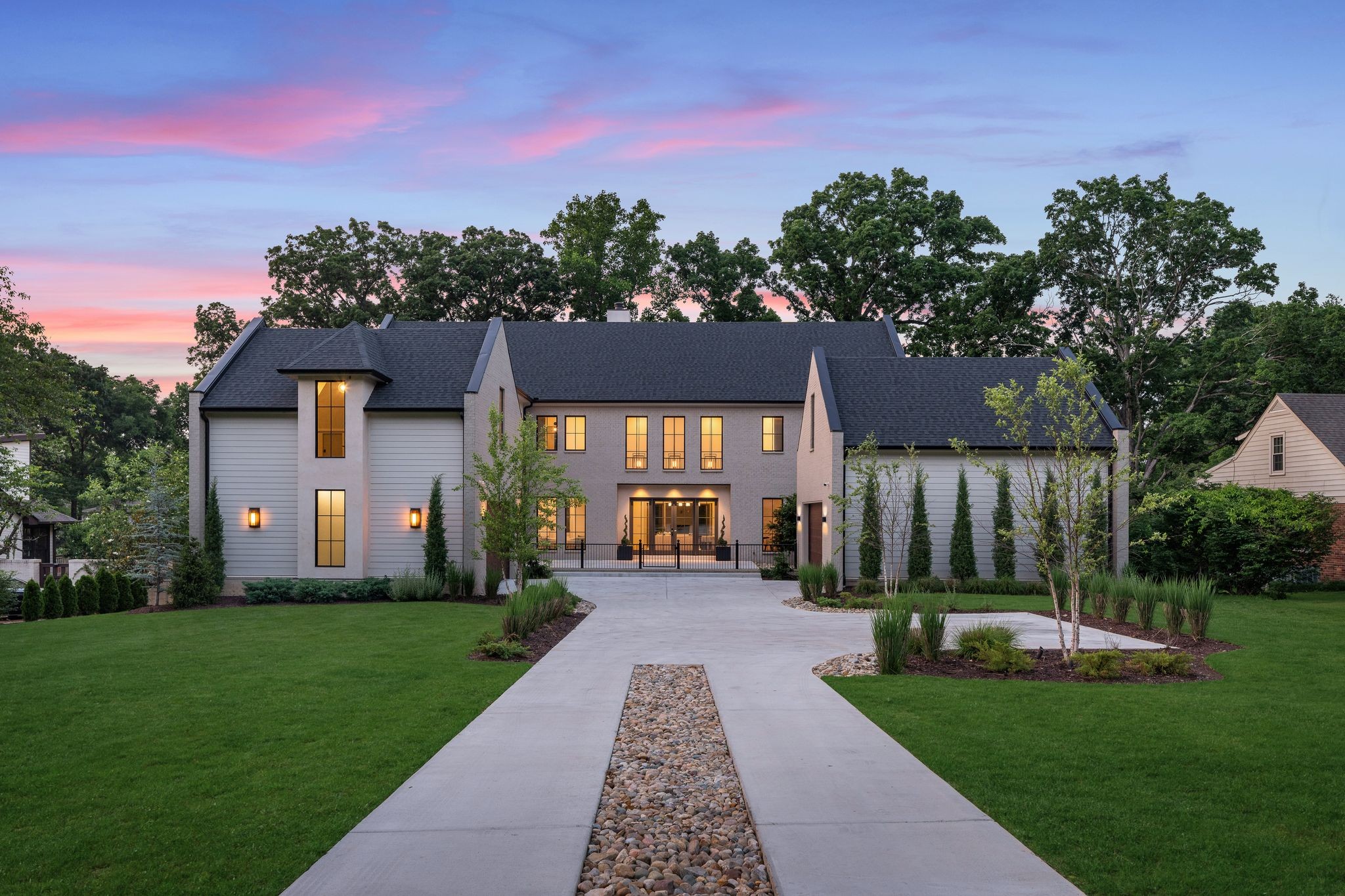 a front view of a house with a yard