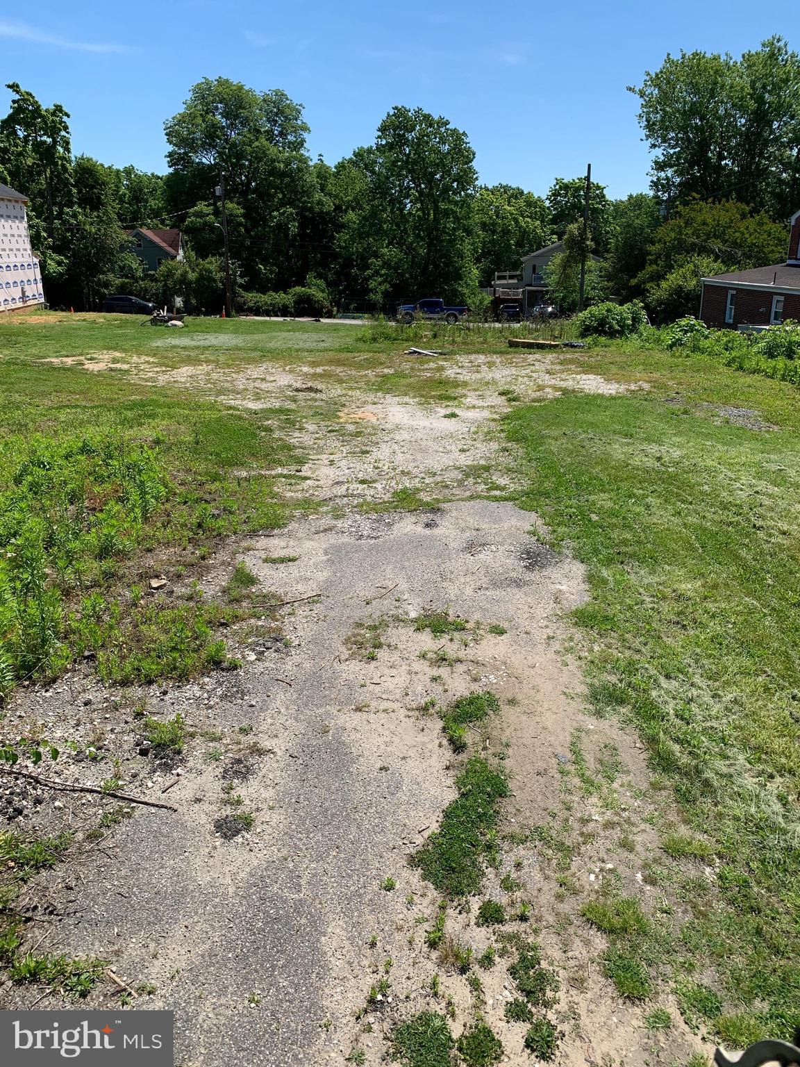 a view of outdoor space with deck and yard