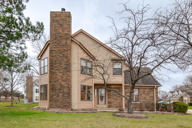 front view of house with a yard