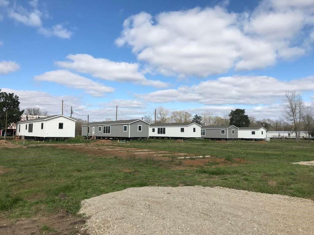 a view of a big yard with a fountain