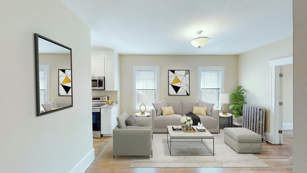 a living room with furniture and a table